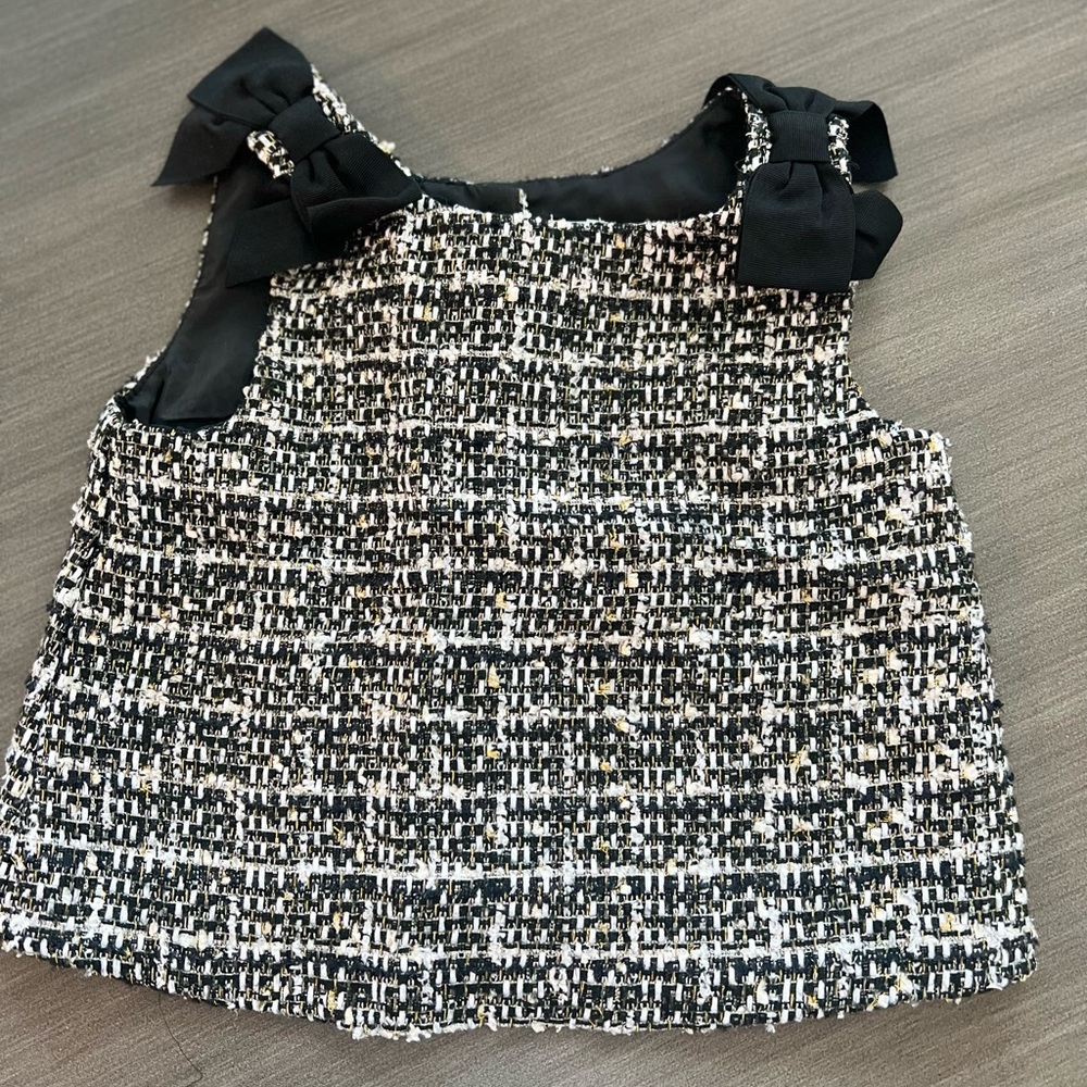 Black, gold, and white dress top